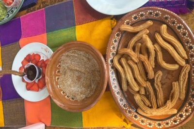 Make your own Churros from scratch - Tacos, tortillas, and molcajete salsa at the table