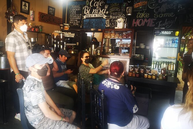 Tour Los Caminos del Mezcal Café and Pedal Loom Factory - Stop 5: Mercado Benito Juárez for smells, snacks, and real shopping