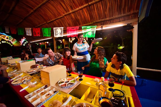 Xoximilco Ticket: Boat Fiesta, Traditional Tasting & Tequila Bar - Boarding the trajinera: colorful boats and small-group vibes